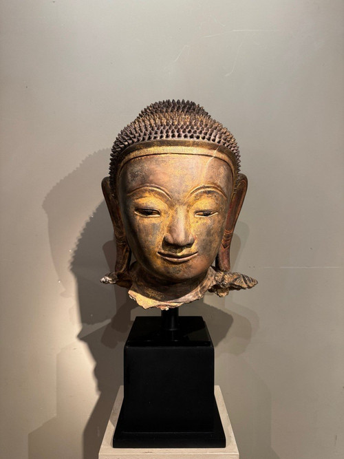 Large gilded terracotta Buddha head, Burma, Shan states, late 18th century.