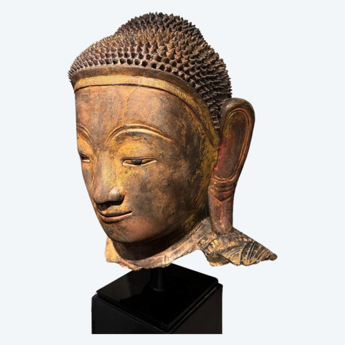 Large gilded terracotta Buddha head, Burma, Shan states, late 18th century.