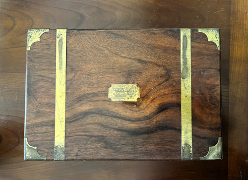 Marine writing desk, in solid mahogany with brass reinforcements, and two secret drawers.