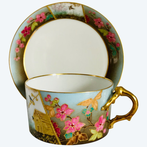 Porcelain teacup with hand-painted decoration circa 1900