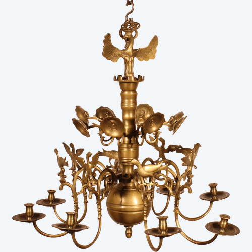 Lampadario rinascimentale in bronzo a 8 rami decorati con uccelli