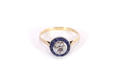 Art Deco solitaire and sapphire ring in 18k gold and platinum, target ring, round ring