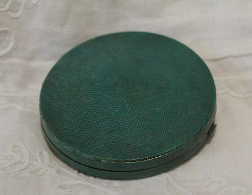 Painted miniature portrait of a woman in her shagreen case circa 1800