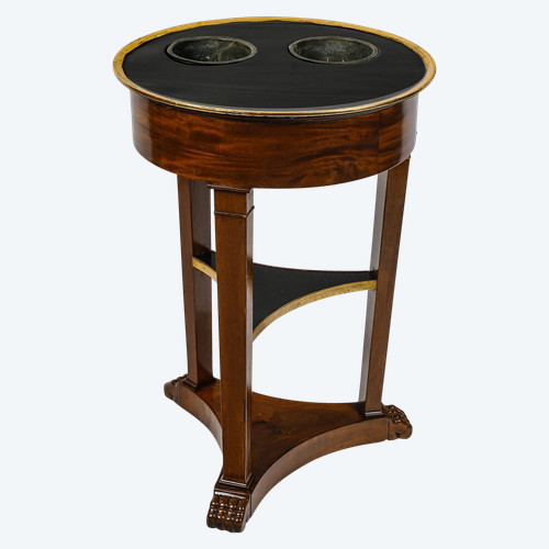 Circular mahogany and blackened mahogany refreshment stand, Empire period circa 1810