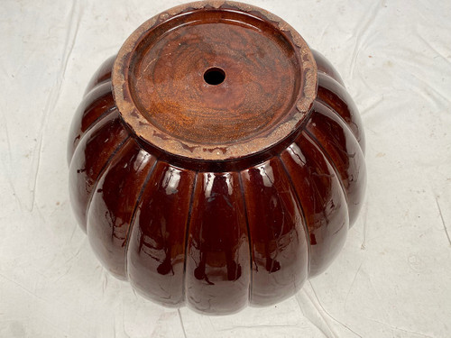 Complete in brown-toned enamelled ceramic, planter on its column