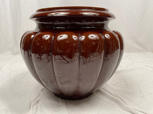 Complete in brown-toned enamelled ceramic, planter on its column