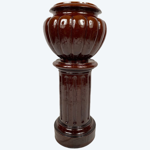 Complete in brown-toned enamelled ceramic, planter on its column