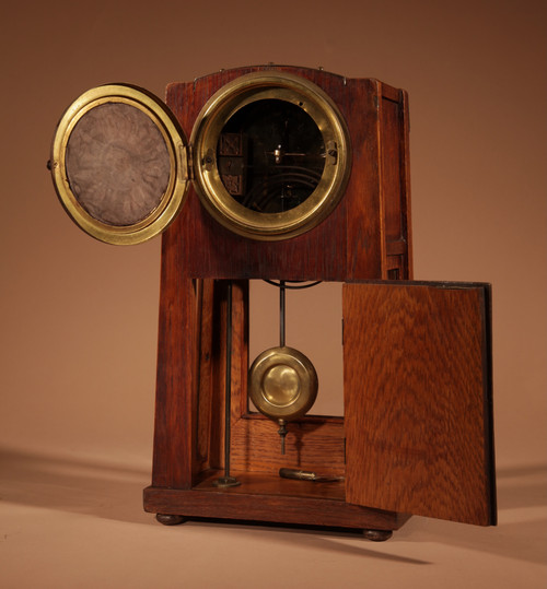 Art Nouveau/Deco Gustav Serrurier-Bovy (1858-1910) A rare oak and brass clock trim,