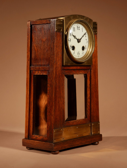 Art Nouveau/Deco Gustav Serrurier-Bovy (1858-1910) A rare oak and brass clock trim,