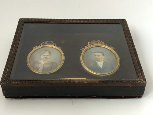 Pair of late 19th century couple miniatures by Georgine Nounckele bronze frame