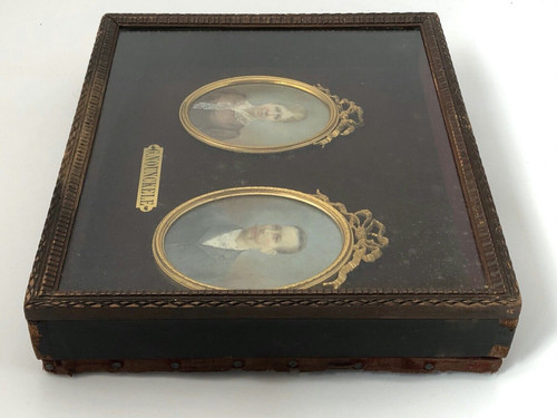 Pair of late 19th century couple miniatures by Georgine Nounckele bronze frame