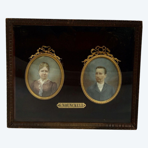 Pair of late 19th century couple miniatures by Georgine Nounckele bronze frame