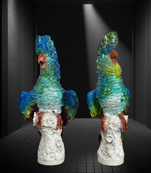 PAIR OF POLYCHROME GLAZED CERAMIC COCKATOOS BEARING A SIGNATURE