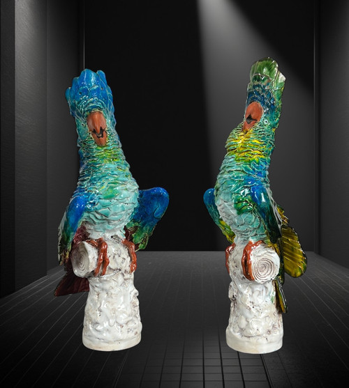 PAIR OF POLYCHROME GLAZED CERAMIC COCKATOOS BEARING A SIGNATURE