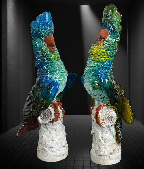 PAIR OF POLYCHROME GLAZED CERAMIC COCKATOOS BEARING A SIGNATURE