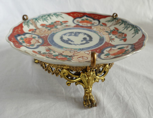 Suite di 4 piatti in bronzo di porcellana giapponese con decorazione Imari