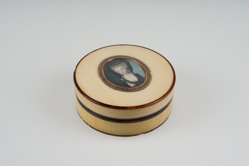 Tortoiseshell box decorated with 18th century miniature of woman with headdress