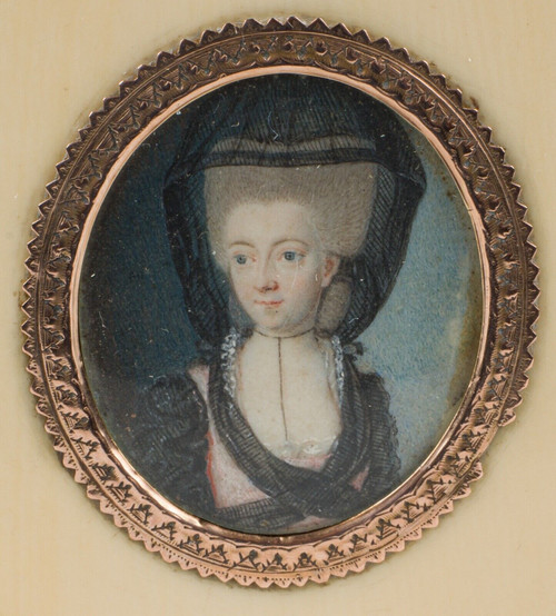 Tortoiseshell box decorated with 18th century miniature of woman with headdress