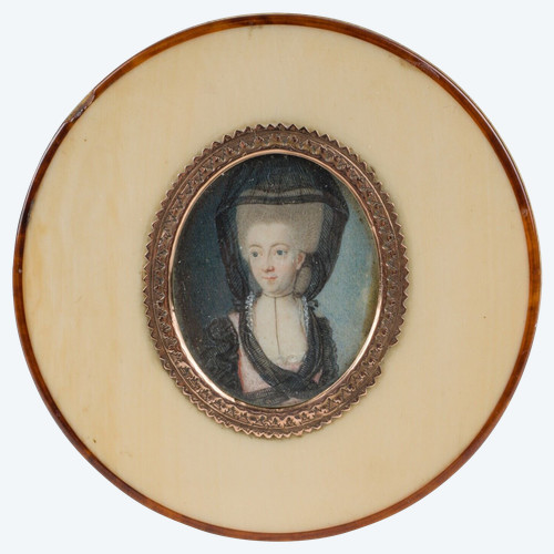 Tortoiseshell box decorated with 18th century miniature of woman with headdress