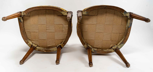 Pair of Louis XVI-style armchairs with medallion backs in carved and waxed molded natural wood