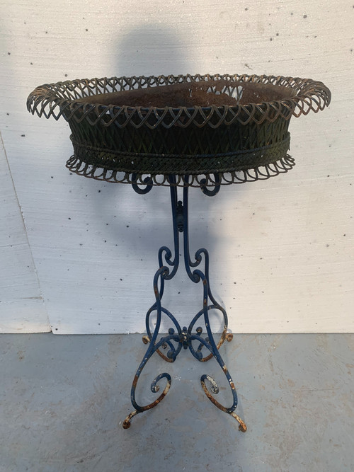 Oval planter on woven metal stand, 20th century