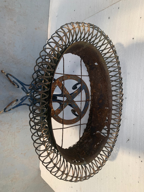 Oval planter on woven metal stand, 20th century