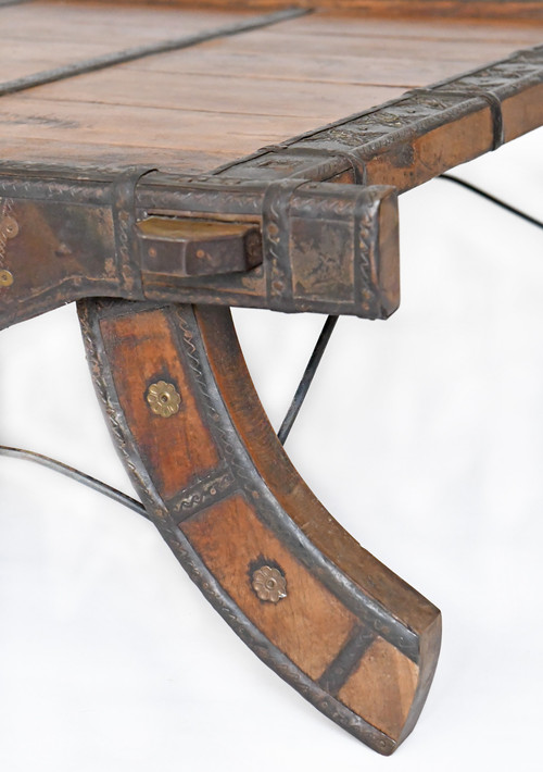 Wood and metal elephant saddle coffee table