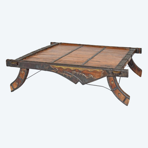 Wood and metal elephant saddle coffee table