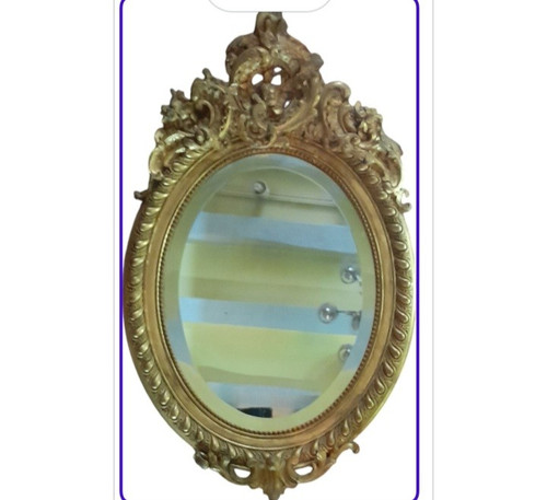 Oval gilded wood mirror