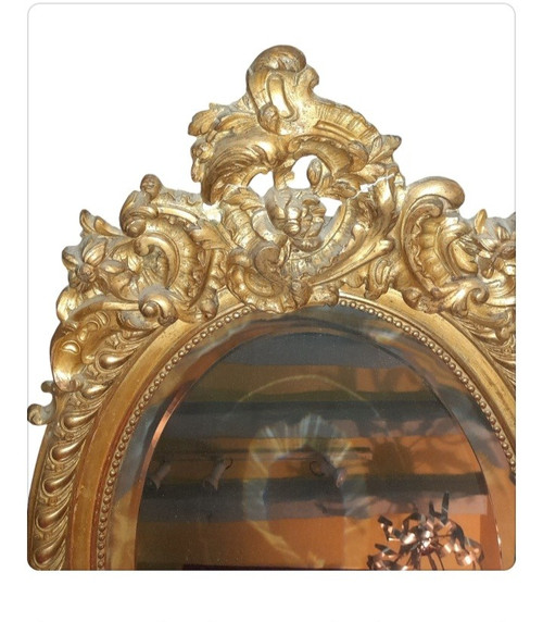 Oval gilded wood mirror