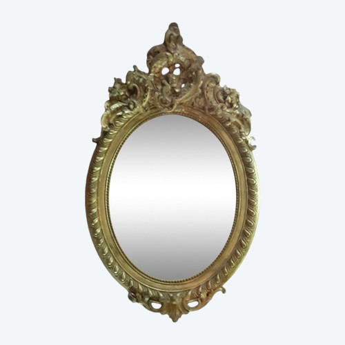 Oval gilded wood mirror