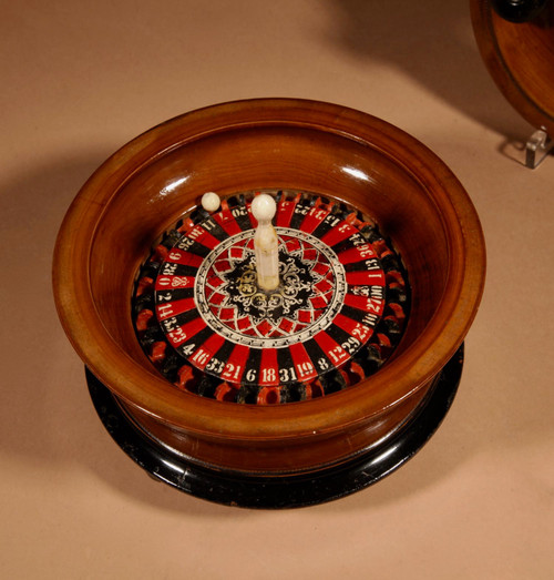  Interesting travel roulette wheel in turned wood.