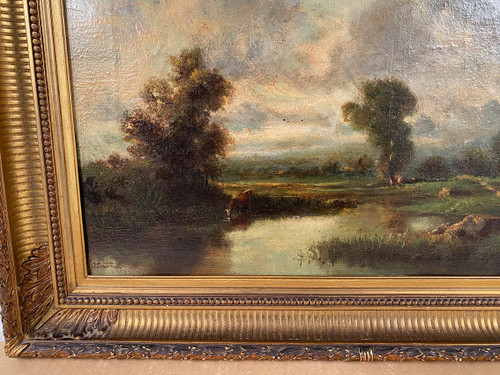 Oil on canvas from the 19th century, "Cows by the river".