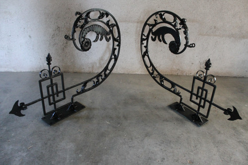 Pair of large wrought iron gallows with Louis XVI style scrollwork, 20th century