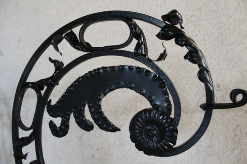 Pair of large wrought iron gallows with Louis XVI style scrollwork, 20th century