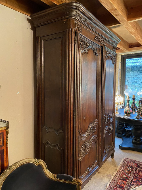 Carved oak cabinet decorated with foliage and flowers, late 18th century