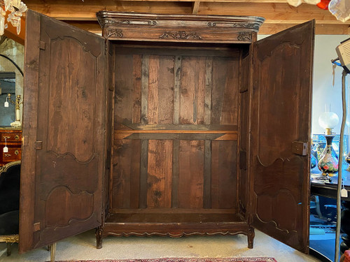 Carved oak cabinet decorated with foliage and flowers, late 18th century