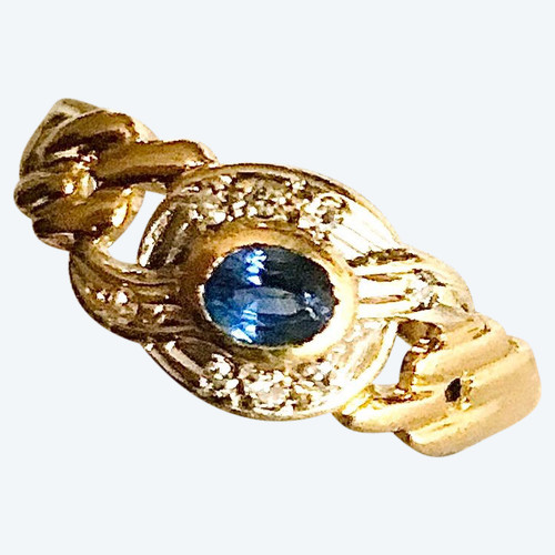 750/1000 gold sapphire and diamond ribbon ring