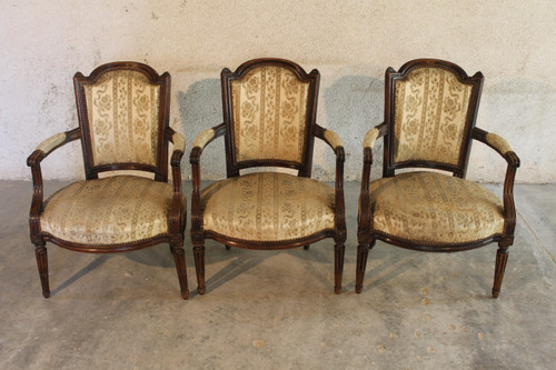 3 Louis XVI armchairs in carved and molded beech, late 18th century