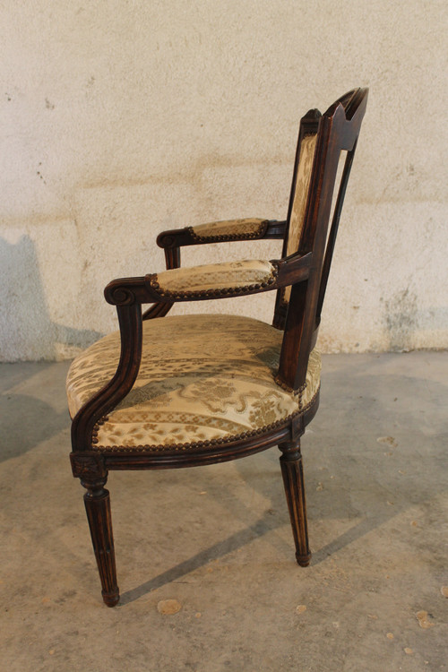 3 Louis XVI armchairs in carved and molded beech, late 18th century