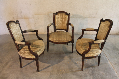 3 Louis XVI armchairs in carved and molded beech, late 18th century