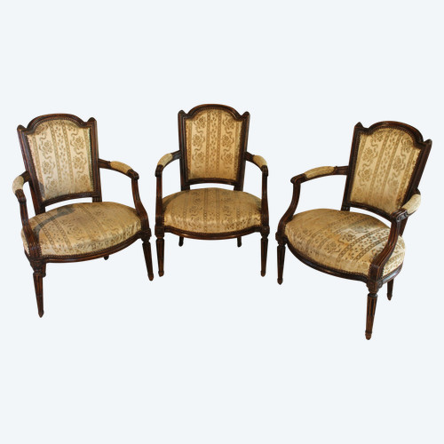 3 Louis XVI armchairs in carved and molded beech, late 18th century