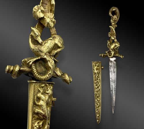 ROMANTIC DAGGER depicting a DRAGON slaying a SERPENT - European work - 19th century