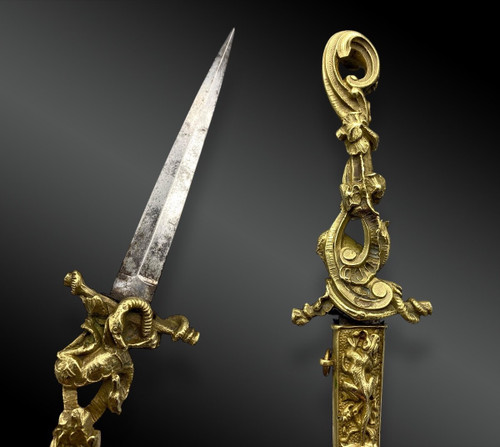 ROMANTIC DAGGER depicting a DRAGON slaying a SERPENT - European work - 19th century