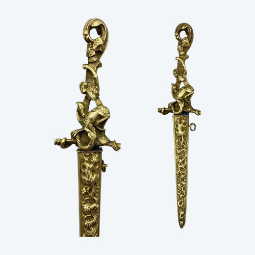 ROMANTIC DAGGER depicting a DRAGON slaying a SERPENT - European work - 19th century