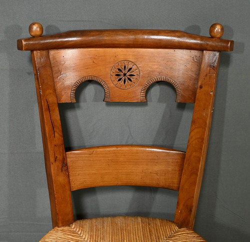 Suite of 4 cherrywood chairs, Directoire period - Early 19th century