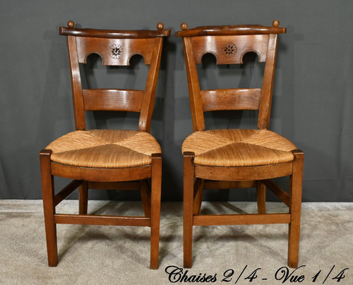 Suite of 4 cherrywood chairs, Directoire period - Early 19th century