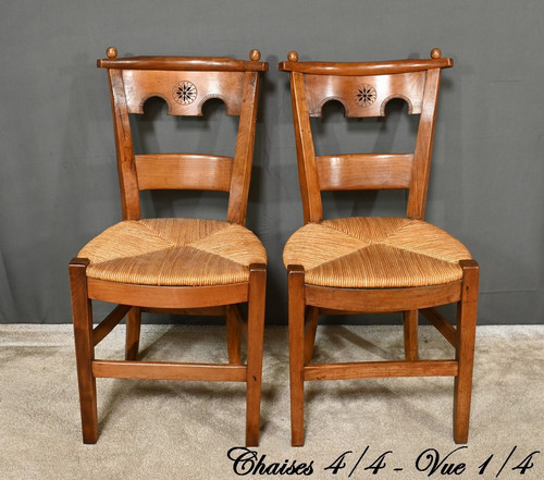 Suite of 4 cherrywood chairs, Directoire period - Early 19th century