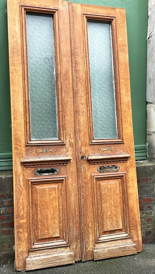 Paire de portes d’entrée en chêne provenant d’une maison bourgeoise