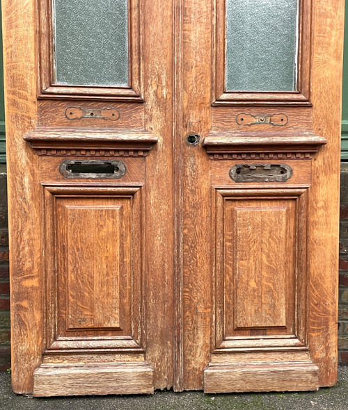 Paire de portes d’entrée en chêne provenant d’une maison bourgeoise